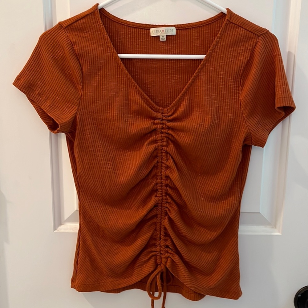 Orange short sleeve top with ruching